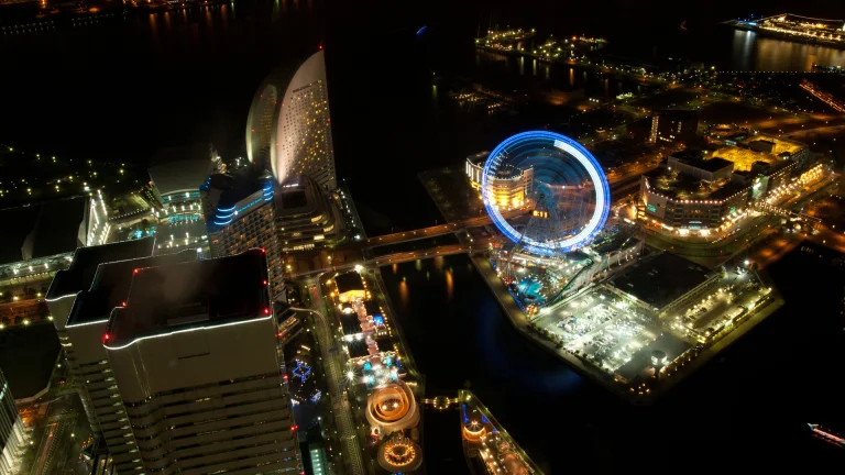 the cosmo clock 21 ferris wheel glowing in the evening sky over yokohama, japan, cities, city, cityscape, cityscapes, ferris wheels, night lights, lights, streetlights, street lamps, lighting, night, skyscrapers, the city at night, architecture, world