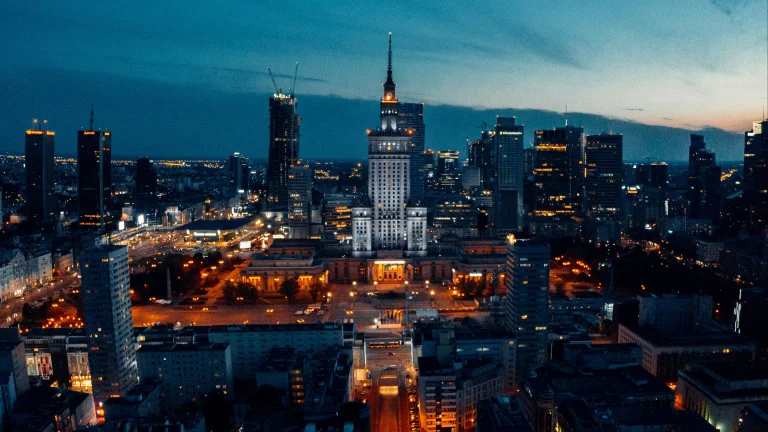 the palace of culture and science, illuminated against the night sky of warsaw, warsaw, poland, cities, city, cityscape, cityscapes, evening, evenings, twilight, dus, night lights, lights, streetlights, street lamps, lighting, night, palace, palaces, sky, skyscrapers, streets, sunsets, sunset, the city at night, architecture, world