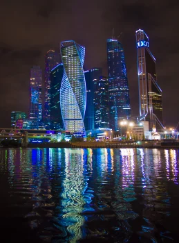 The lights of the Moscow City skyscrapers above the Moscow River