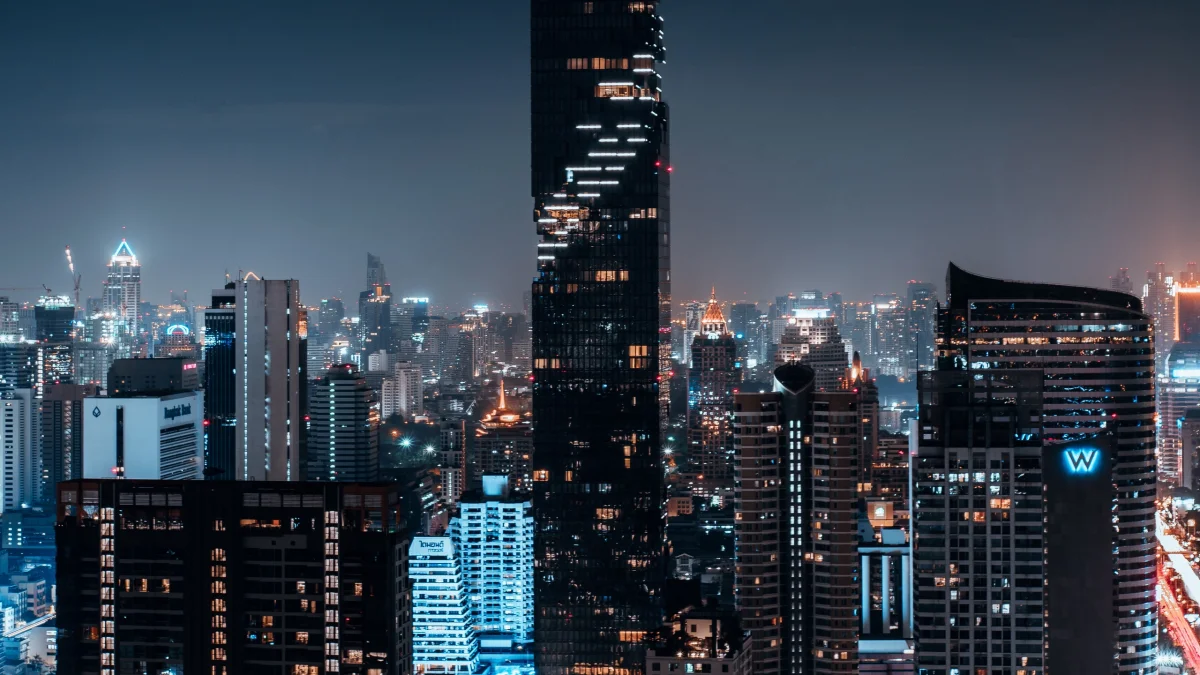 the silhouette of the mahanakhon skyscraper against the backdrop of bangkok's lights, bangkok, thailand, cities, city, cityscape, cityscapes, night lights, lights, streetlights, street lamps, lighting, night, skyscrapers, the city at night, architecture, world