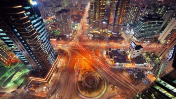 a bustling intersection in seoul, bathed in the glow of the night lights, seoul, south korea, cars, automobiles, cities, city, cityscape, cityscapes, night lights, lights, streetlights, street lamps, lighting, night, roads, highways, motorways, avenues, driveways, passageways, skyscrapers, streets, the city at night, architecture, world