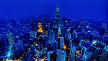 The Petronas Towers Lit Up Against the Skyline of Kuala Lumpur