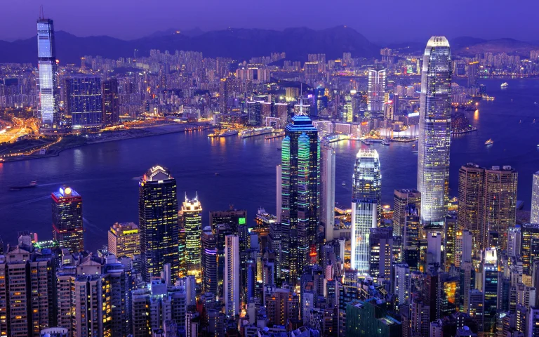 The lights of Hong Kong's skyscrapers at dusk