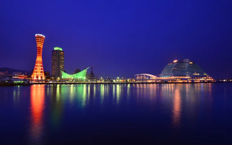 the lights of the port of kobe against the dark sky, cities, city, cityscape, cityscapes, hotels, japan, night lights, lights, streetlights, street lamps, lighting, night, reflections, sea, skyscrapers, the city at night, architecture, world