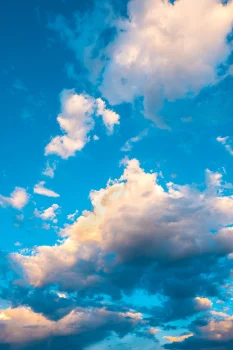 white clouds bathed in sunlight against a bright blue sky, clouds, sky, nature