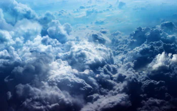 Thick cumulus clouds in the sunlight