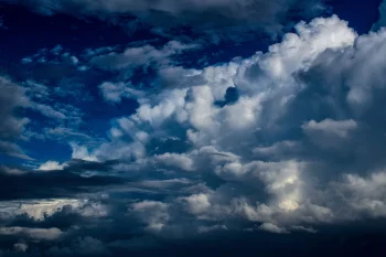 Thunderclouds in the deep blue sky