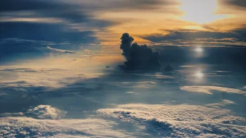 a golden sunset over a thick layer of clouds, clouds, landscapes, sky, sun, sun rays, sunlight, rays, sunsets, sunset, nature