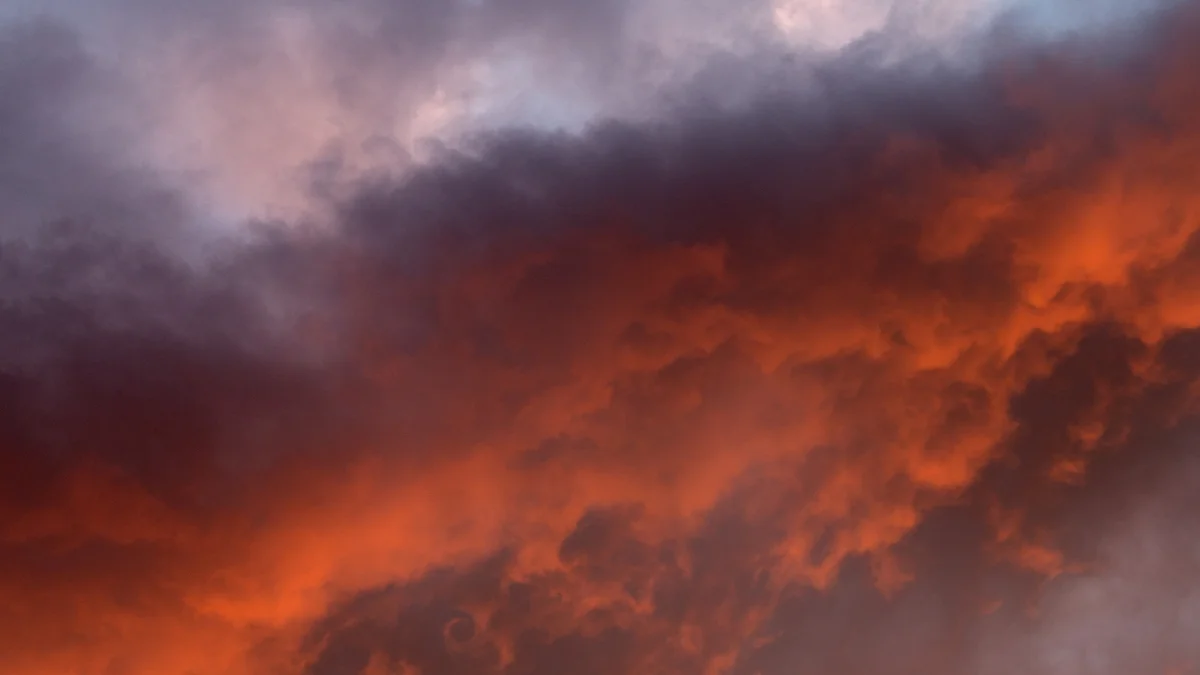 Flaming sunset clouds in the evening sky