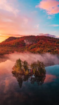 An autumn sunrise over a secluded island in Canada