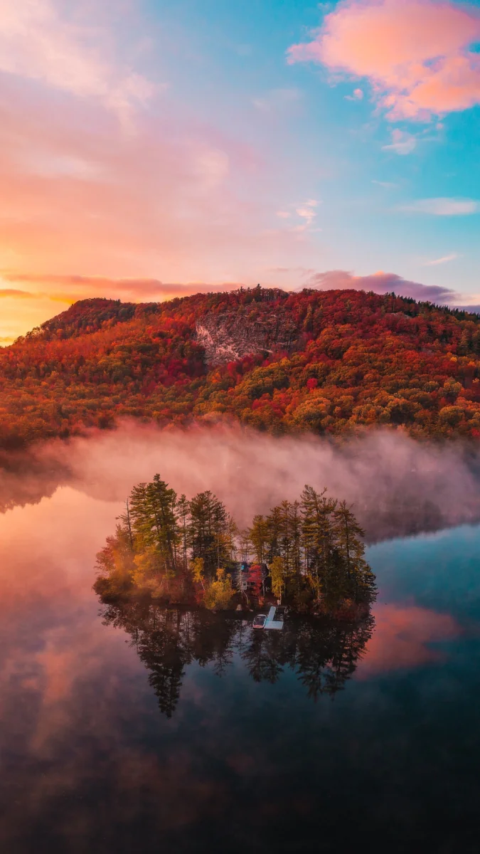 An autumn sunrise over a secluded island in Canada