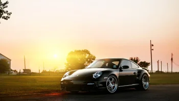 черный porsche 911 на фоне золотистого закатного неба, porsche 911, porsche, вечер, вечера, сумерки, дороги, пути, трассы, шоссе, магистрали, автострады, проспекты, проезды, закаты, закат, купе, машины, автомобили, небо, порше, солнце, солнечные лучи, солнечный свет, спорткары, авто