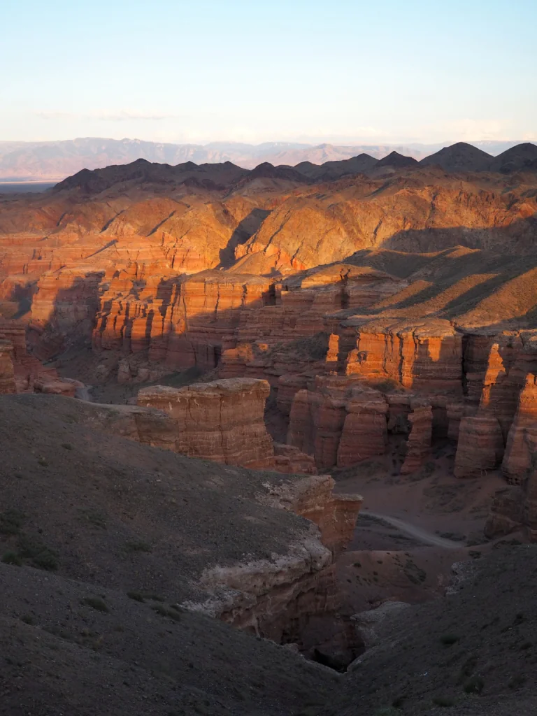 The rays of the setting sun on the slopes of the Charyn Canyon in Kazakhstan