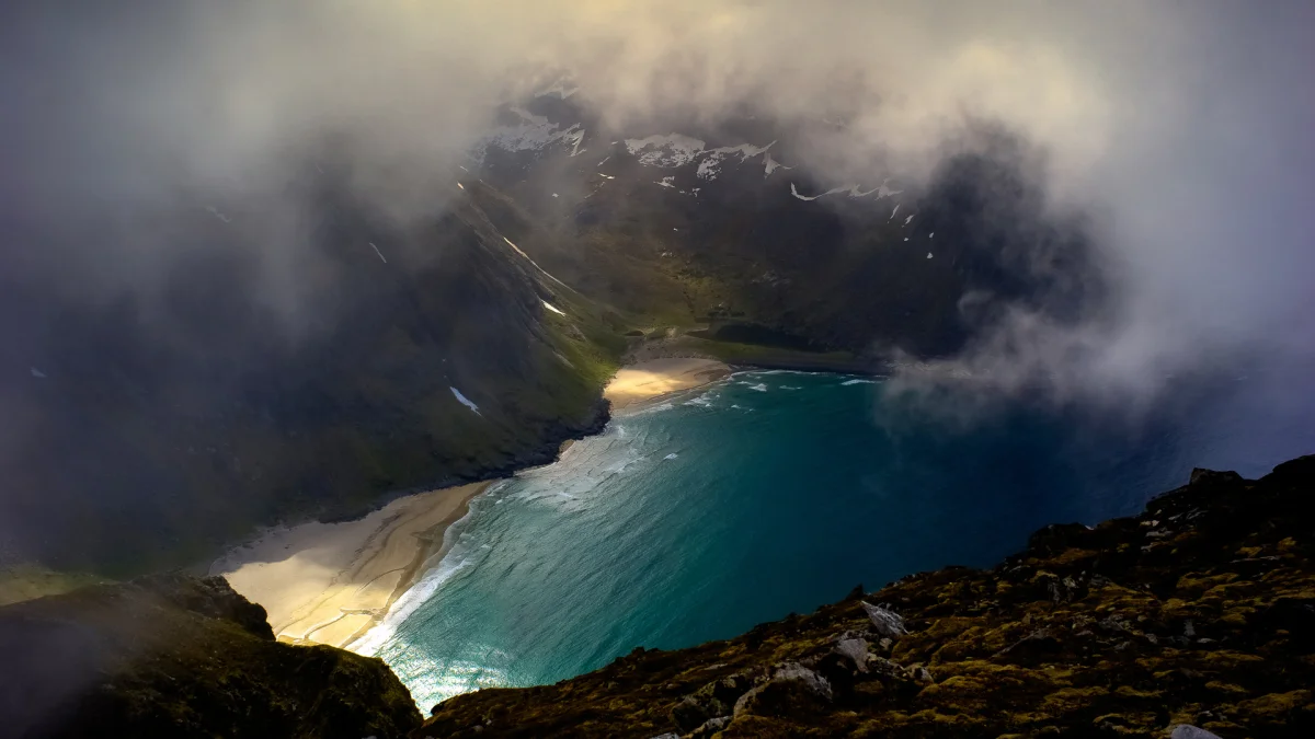 A view of Kvalika Bay in Norway through the clouds