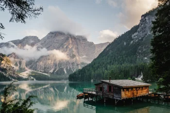 A wooden cabin by Lake Braies in the Italian Alps