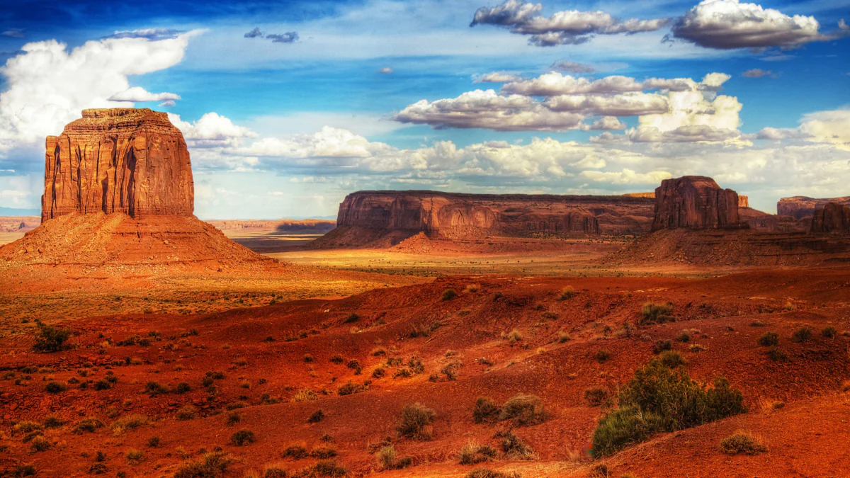 The red cliffs of Monument Valley under a cloudy sky in the U.S.