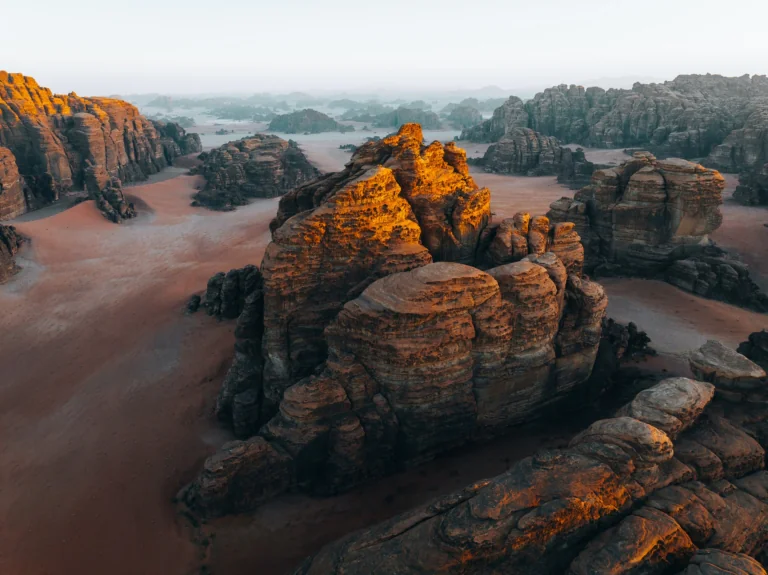 The golden rays of the setting sun on the rocks of the Wadi Rum desert