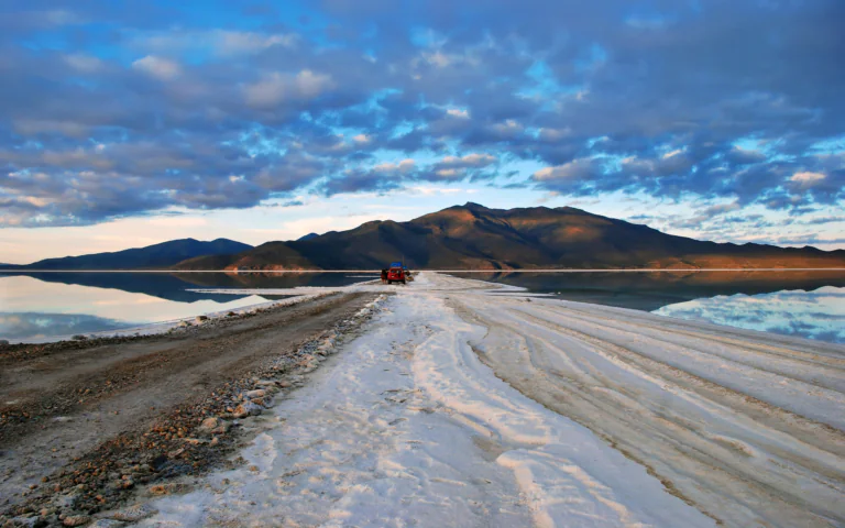 A red SUV on the Uyuni Salt Flats in Bolivia