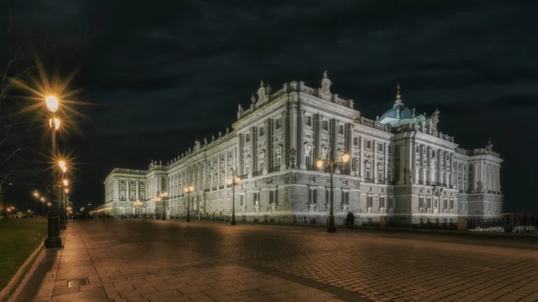 The Royal Palace in Madrid, illuminated by streetlights