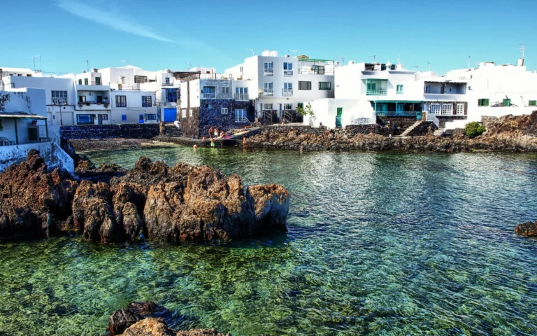 The snow-white houses of Punta Mujeres on the coast of Lanzarote