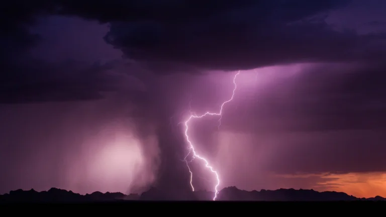 A lightning strike over the horizon in an American desert