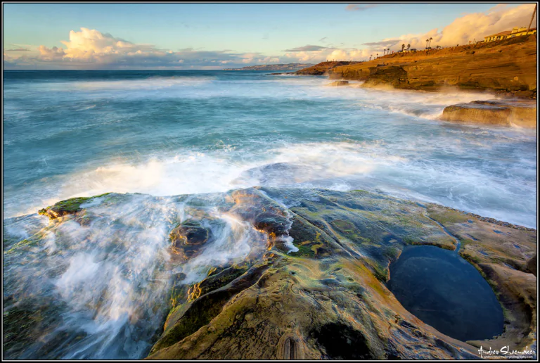 Sunset rays over the rocky coastline of La Jolla, California