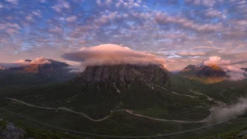 Sunset clouds over the Scottish mountain Buachail Etiv Mor