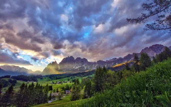 Golden rays of sunlight over the alpine meadows of the Dolomites
