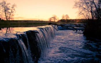 a tranquil stream against the backdrop of the sunset sky, branches, evening, evenings, twilight, dus, landscapes, rivers, canals, streams, sky, sunsets, sunset, trees, waterfalls, nature