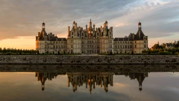 Sunset at the walls of Chambord in France