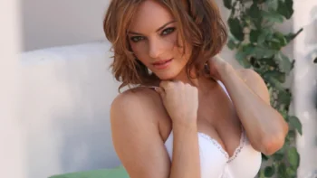 Portrait of a Girl with Chestnut Hair in White Lingerie