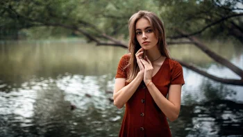A Girl by the Pond