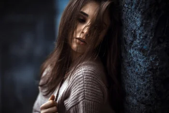 a girl in a knitted sweater, brunettes, emotions, girls, young women, models, stones, walls, other, people