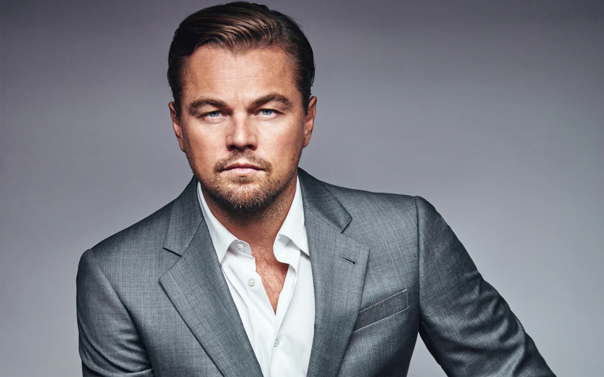 Leonardo DiCaprio in a sleek gray suit