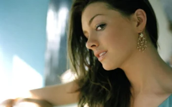 Anne Hathaway in the soft light by the window