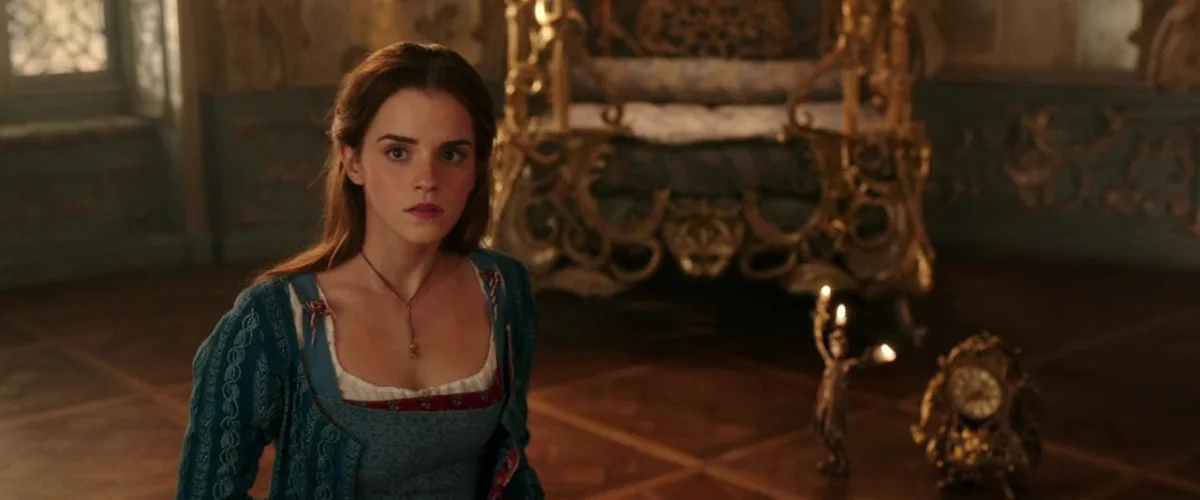 Emma Watson as Belle inside the Beast's castle