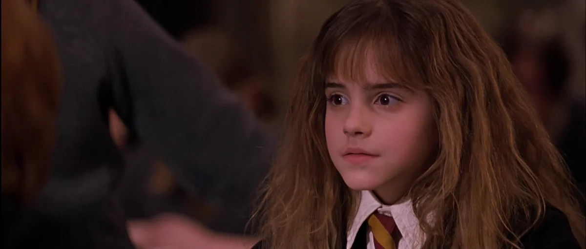 Young Hermione Granger in her Hogwarts uniform