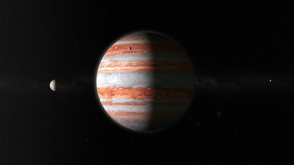 Jupiter and its moons in the deep darkness