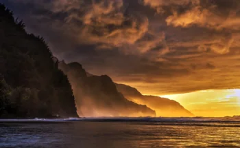 A golden sunset over the Na Pali Coast in Hawaii