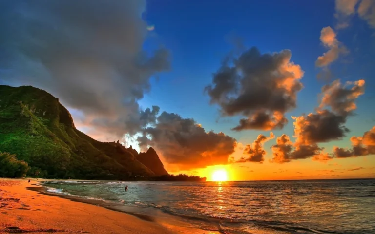 A golden sunset over the coast of Kauai