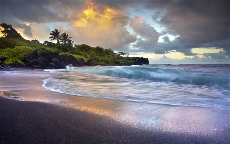 The black sand of Wai'anapanapa Beach in Hawaii