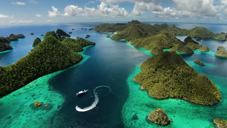An aerial view of the emerald islands of Raja Ampat in Indonesia