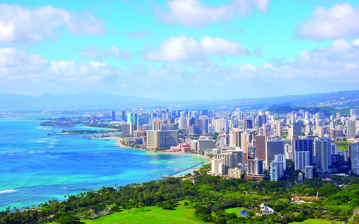 A panoramic view of Honolulu's skyscrapers and the Waikiki coastline