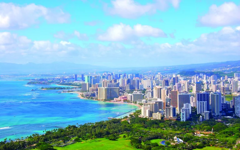 A panoramic view of Honolulu's skyscrapers and the Waikiki coastline