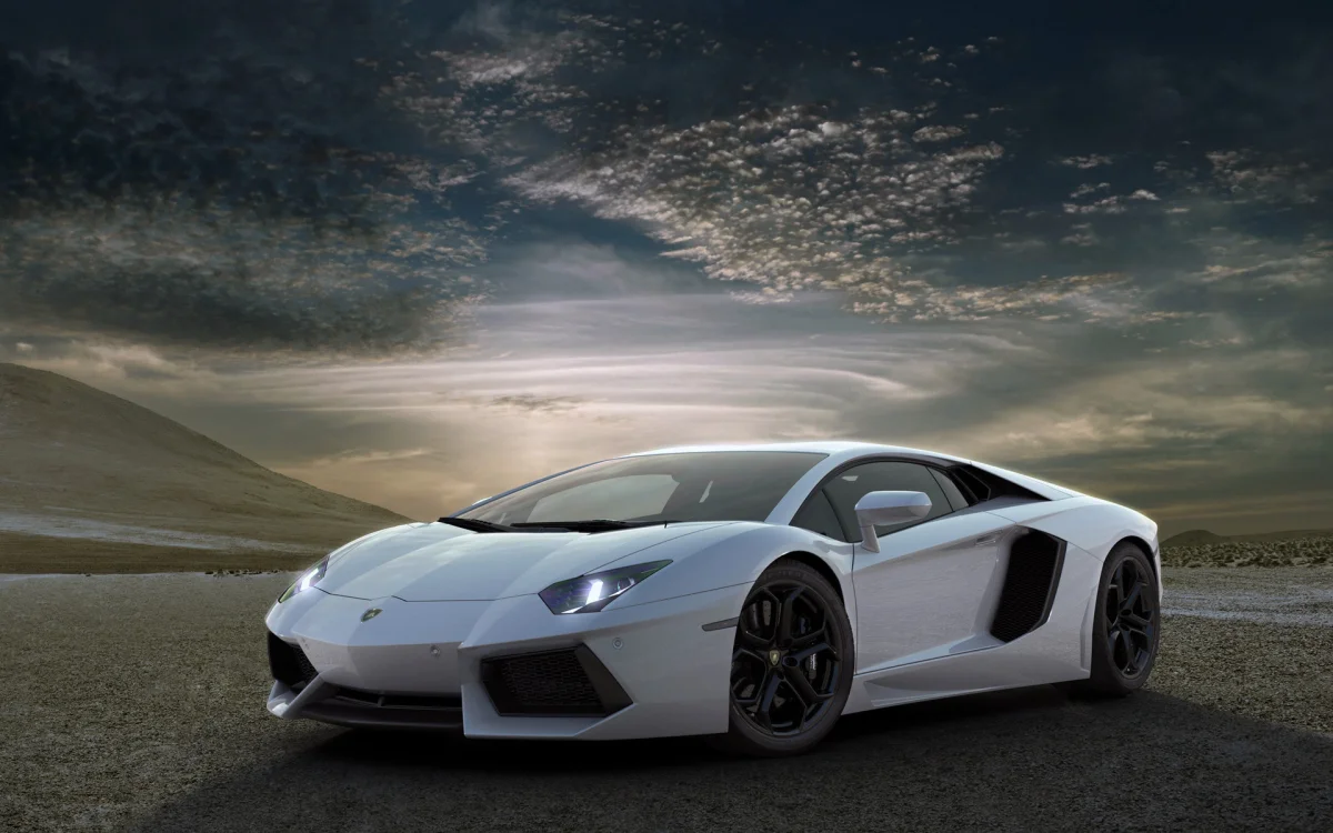 A white Lamborghini Aventador against a pre-storm sky