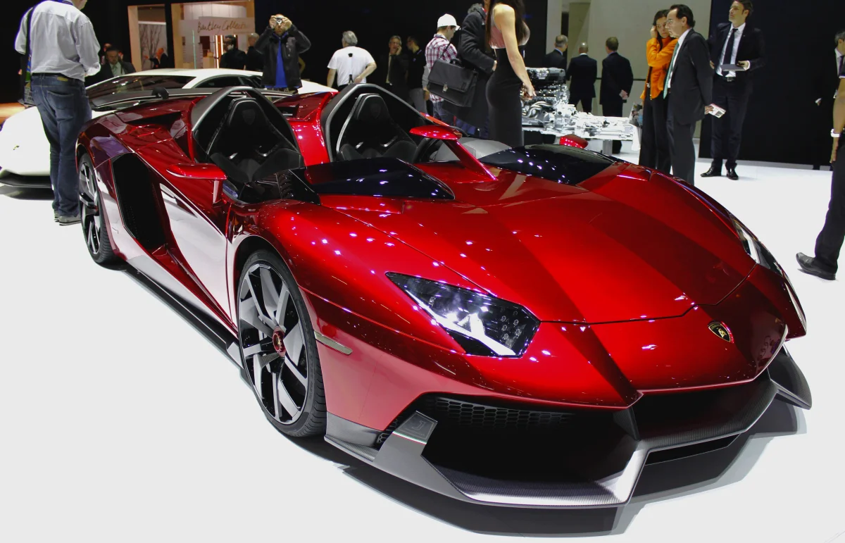 A red Lamborghini Aventador J at the exhibition booth