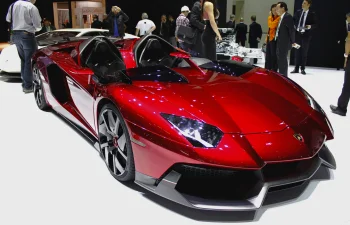 A red Lamborghini Aventador J at the exhibition booth