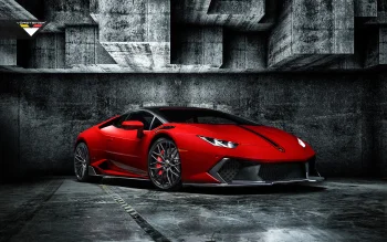A red Lamborghini Huracan against a backdrop of concrete blocks