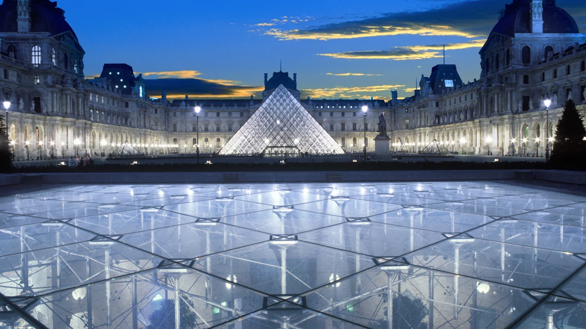 A Glowing Glass Pyramid in Paris at Night
