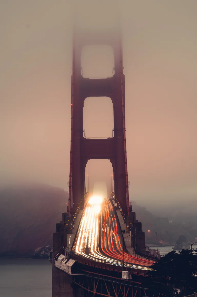 the lights of evening traffic on the golden gate bridge, bridges, california, fog, golden gate, landscapes, mountains, peaks, hills, night lights, lights, streetlights, street lamps, lighting, night, roads, highways, motorways, avenues, driveways, passageways, san francisco, usa, united states, architecture, world